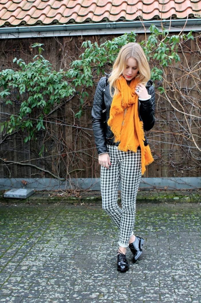 Black leather jacket and hounstooth pants by Zara